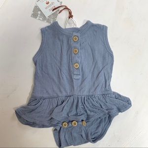 Kate Quinn Pointelle Skirted Onesie